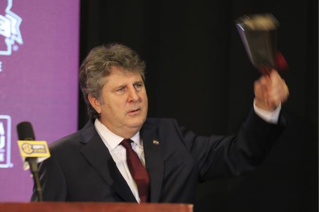New Mississippi State University head football coach Mike Leach rings his cowbell one last time before leaving stage before reporters and school supporters, Friday, Jan. 10, 2020, at the Starkville, Miss., based university, after being officially introduced as the head coach. (AP Photo/Rogelio V. Solis)