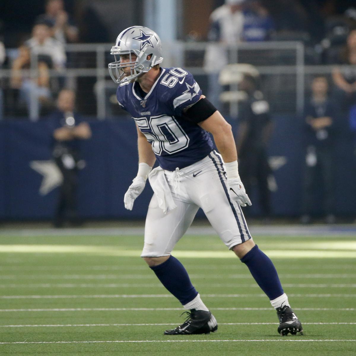 Dallas Cowboys linebacker Sean Lee, left, shops alongside Ajion