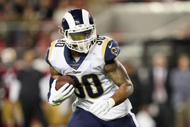FILE - In this Saturday, Dec. 21, 2019 file photo, Los Angeles Rams running back Todd Gurley II carries against the San Francisco 49ers during the first half of an NFL football game in Santa Clara, Calif.  The Los Angeles Rams have released running back Todd Gurley, their superstar running back with a massive contract and a troubling injury history. The Rams made the move Thursday, March 19, 2020 several minutes before roughly $10 million in the three-time Pro Bowl selection's contract became fully guaranteed. (AP Photo/Tony Avelar, File)