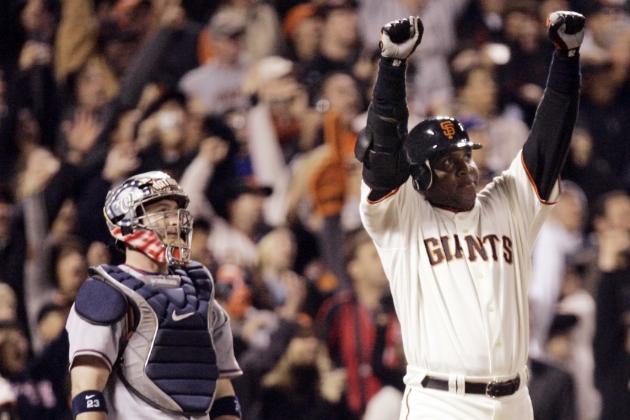 FILE - In this Aug. 7, 2007, file photo, San Francisco Giants Barry Bonds celebrates after his 756th career home run in the fifth inning of a baseball game against the Washington Nationals in San Francisco. Bonds will have his No. 25 jersey retired this August by the Giants when his former Pittsburgh Pirates are in town, the team announced Tuesday, Feb. 6, 2018. (AP Photo/Eric Risberg, File)