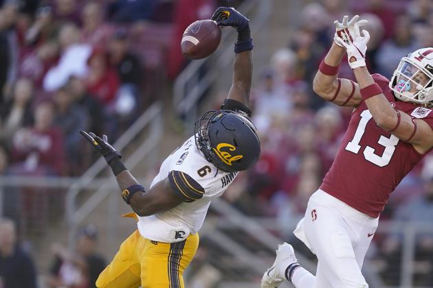 California safety Jaylinn Hawkins (6) intercepts a pass for Stanford wide receiver Simi Fehoko (13) during the second half of an NCAA college football game Saturday, Nov. 23, 2019 in Stanford, Calif. (AP Photo/Tony Avelar)
