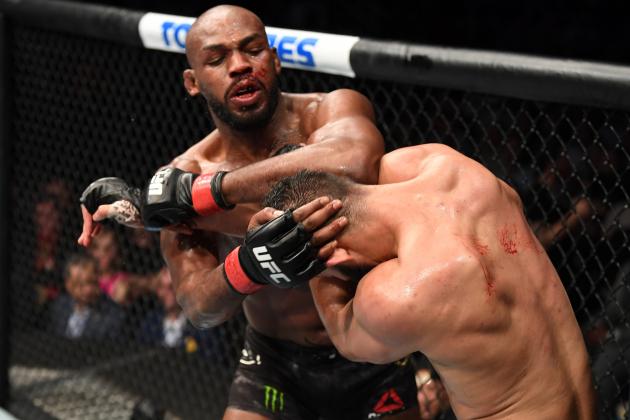 HOUSTON, TEXAS - FEBRUARY 08:  (L-R) Jon Jones elbows Dominick Reyes in their light heavyweight championship bout during the UFC 247 event at Toyota Center on February 08, 2020 in Houston, Texas. (Photo by Josh Hedges/Zuffa LLC via Getty Images)