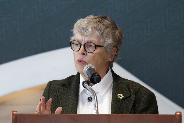 In this Oct. 20, 2017, photo, Michigan State University President Lou Anna Simon speaks during the dedication ceremony for the Gilbert Pavilion and Tom Izzo Hall of History inside Michigan State's Breslin Student Events Center in East Lansing, Mich. Simon submitted her resignation Wednesday, Jan. 24, 2018, amid an outcry over the school's handling of allegations against Larry Nassar. (AP Photo/Al Goldis, File)