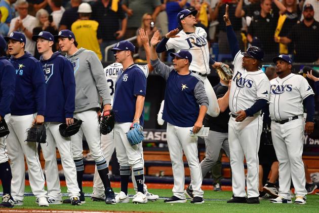 ST PETERSBURG, FLORIDA - OCTOBER 07:  The Tampa Bay Rays celebrate after defeating the Houston Astros 10-3 in Game Three of the American League Division Series at Tropicana Field on October 07, 2019 in St Petersburg, Florida. (Photo by Julio Aguilar/Getty Images)