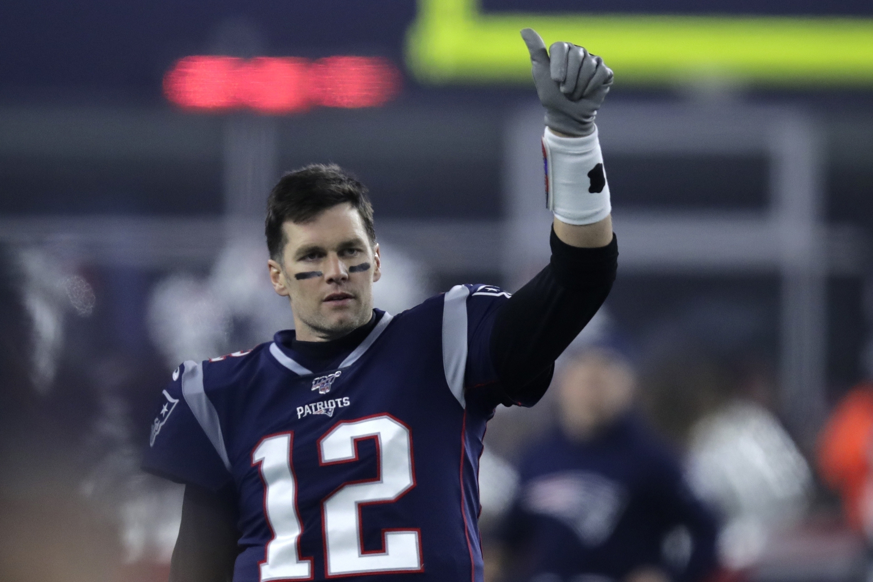 Tom Brady, Bucs players take the field at Tampa's Berkeley Prep