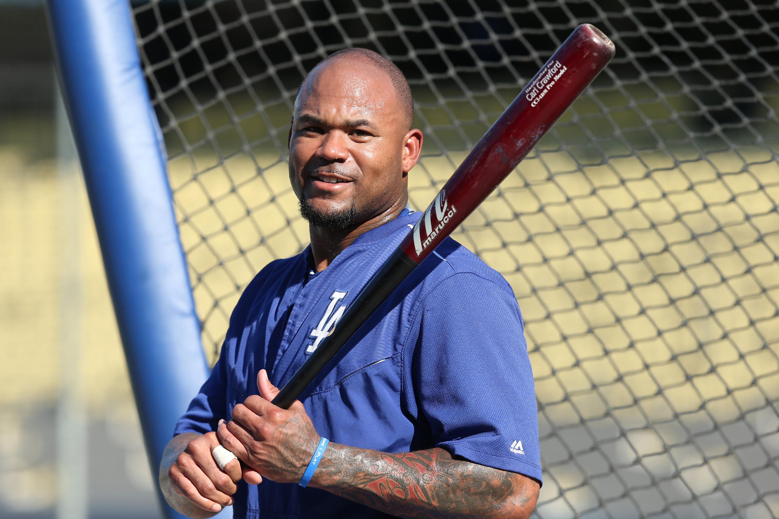 Fan who allegedly yelled racial slur at Carl Crawford is a police