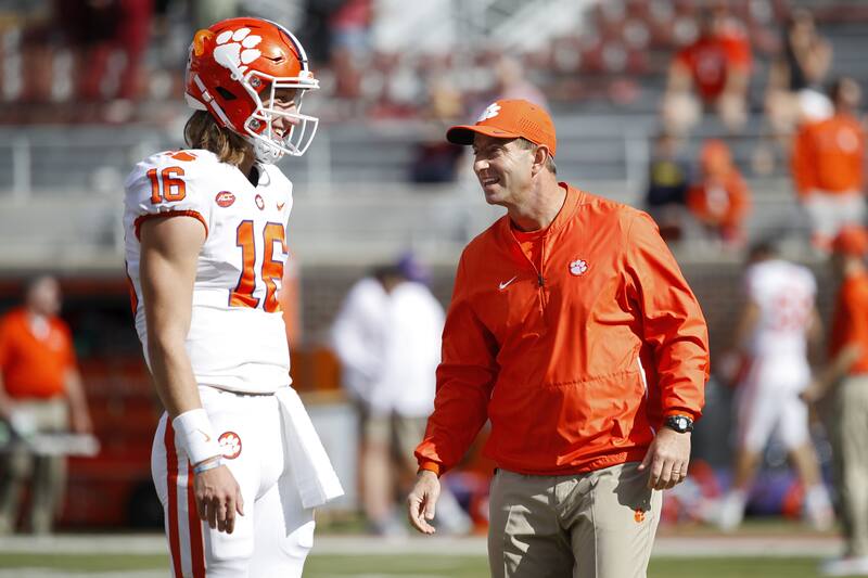 Trevor Lawrence Defends Photo Of Dabo Swinney Wearing Football