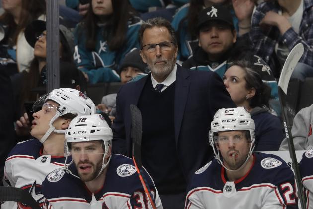 Columbus Blue Jackets head coach John Tortorella, center, watches against the San Jose Sharks during an NHL hockey game in San Jose, Calif., Thursday, Jan. 9, 2020. (AP Photo/Jeff Chiu)