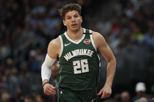 Milwaukee Bucks guard Kyle Korver (26) in the second half of an NBA basketball game Monday, March 9, 2020, in Denver. The Nuggets won 109-95. (AP Photo/David Zalubowski)