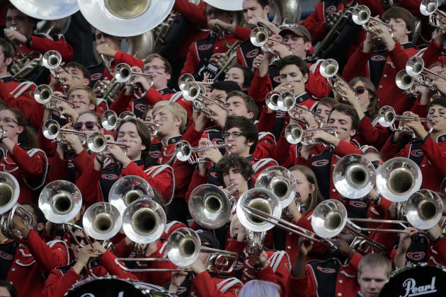 Members of the Georgia Redcoats Band performs prior to the start of an NCAA college football game against Auburn in Auburn, Ala., Saturday, Nov. 16, 2013. (AP Photo/Dave Martin)