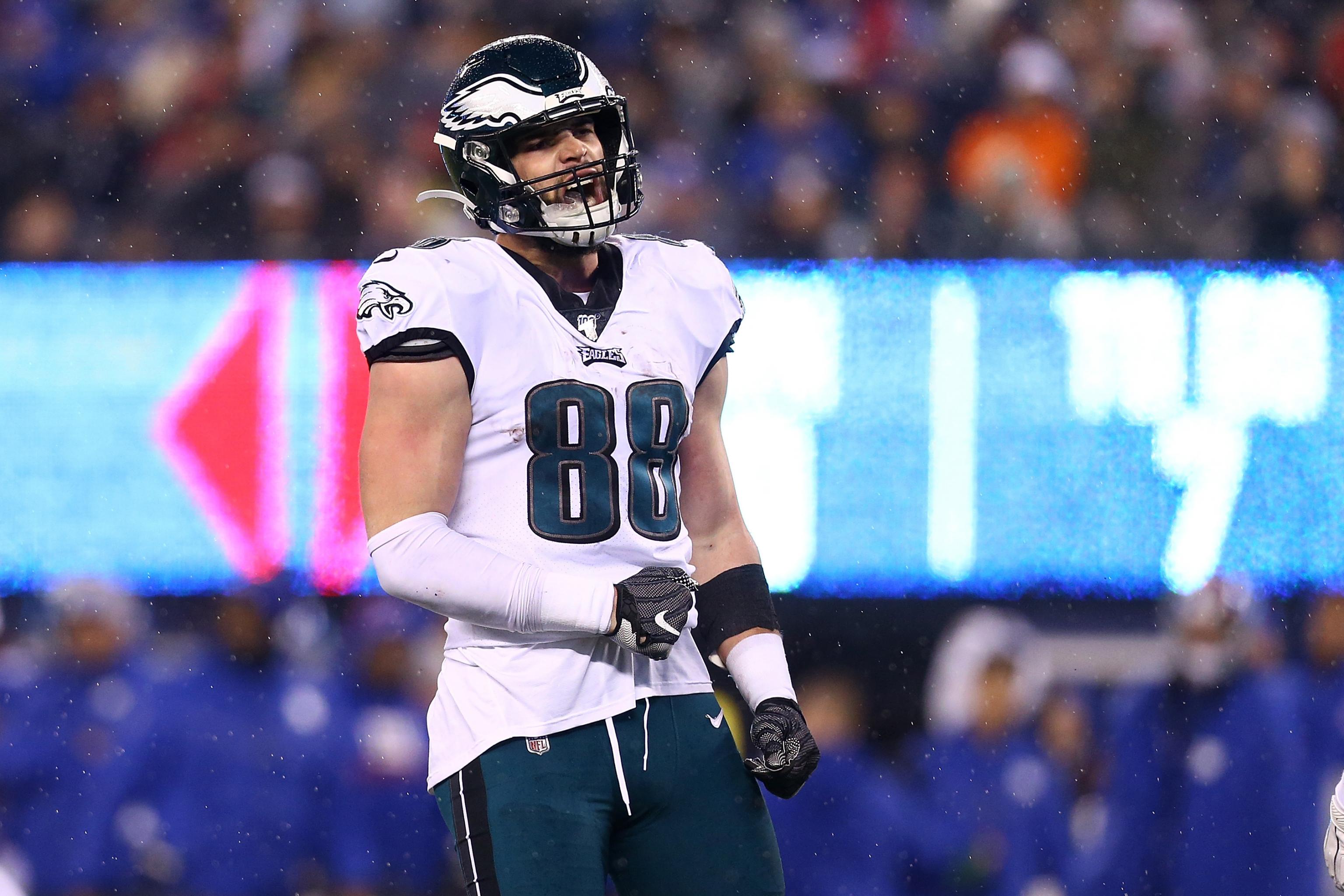 Philadelphia Eagles' Dallas Goedert, left, catches a pass in front