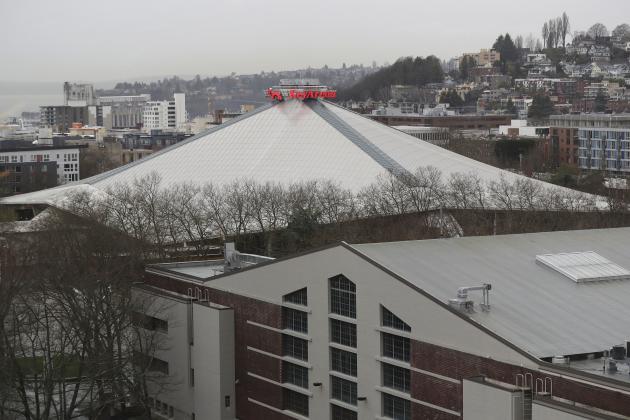 KeyArena at the Seattle Center is seen from a lower level of the Space Needle, Wednesday, Jan. 9, 2019, in Seattle. NHL commissioner Gary Bettman said Wednesday that the NHL has promised Seattle it will host the hockey All-Star Game within its first seven seasons, with the team slated to begin play in 2021-22 in a renovated KeyArena. Bettman also said Seattle will host the NHL draft, likely before the All-Star Game arrives. (AP Photo/Ted S. Warren)