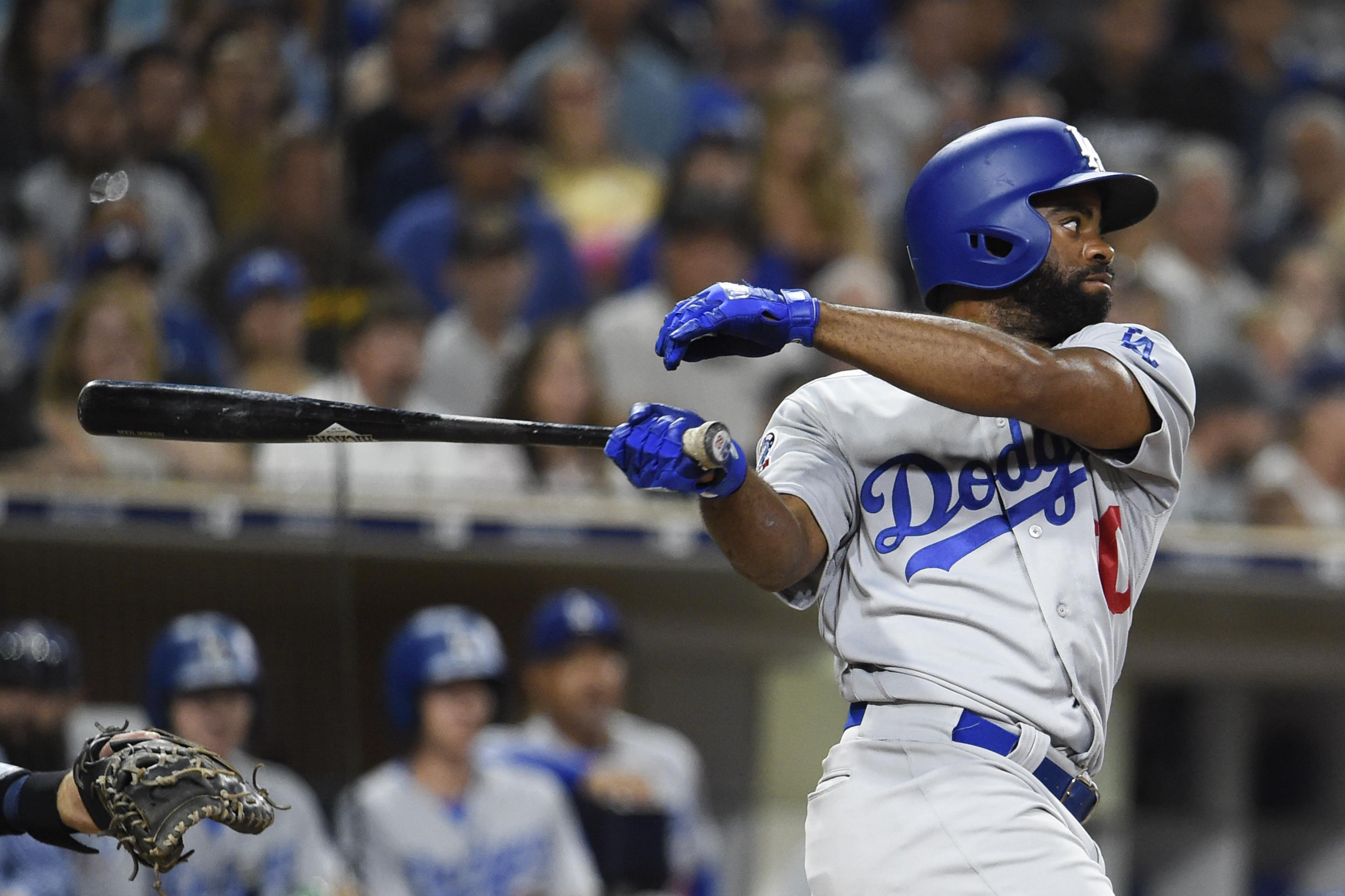 Dodgers' Andrew Toles arrested after sleeping behind Florida airport