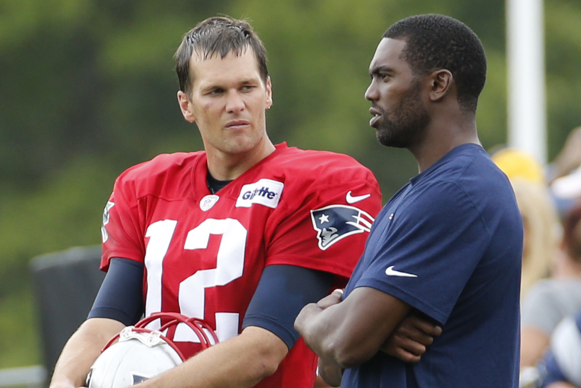 Is Tom Brady trying to recruit Randy Moss to the Buccaneers?