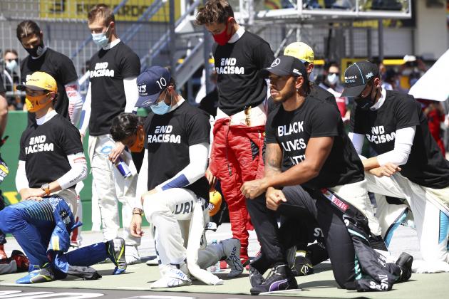 Drivers take a knee n support of the Black Lives Matter movement before the Austrian Formula One Grand Prix race at the Red Bull Ring racetrack in Spielberg, Austria, Sunday, July 5, 2020. (Dan Istitene/Pool via AP)
