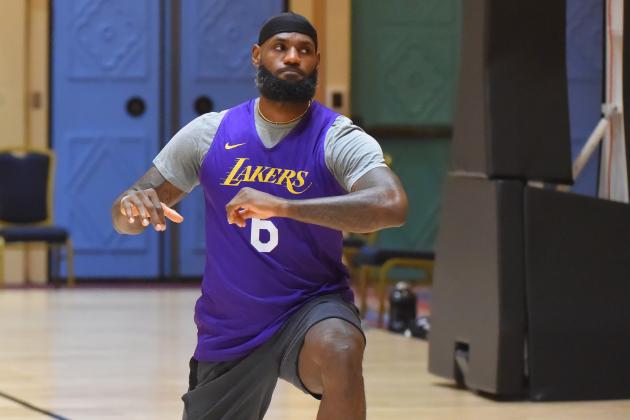 ORLANDO, FL - JULY 11: LeBron James of the Los Angeles Lakers stretches during practice as part of the NBA Restart 2020 on July 11, 2020 in Orlando, Florida. NOTE TO USER: User expressly acknowledges and agrees that, by downloading and/or using this photograph, user is consenting to the terms and conditions of the Getty Images License Agreement.  Mandatory Copyright Notice: Copyright 2020 NBAE (Photo by Bill Baptist/NBAE via Getty Images)