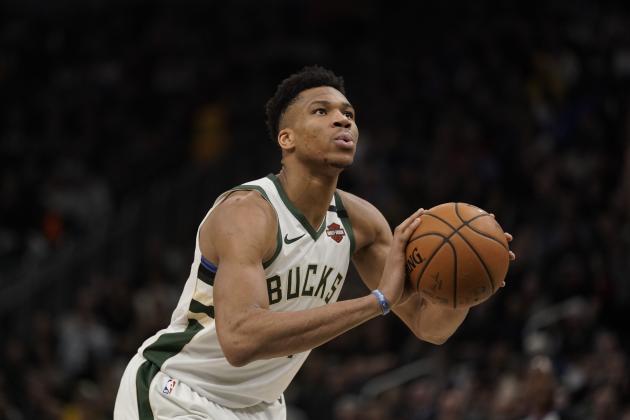 Milwaukee Bucks' Giannis Antetokounmpo shoots during the second half of an NBA basketball game against the Indiana Pacers Wednesday, March 4, 2020, in Milwaukee. The Bucks won 119-100. (AP Photo/Morry Gash)