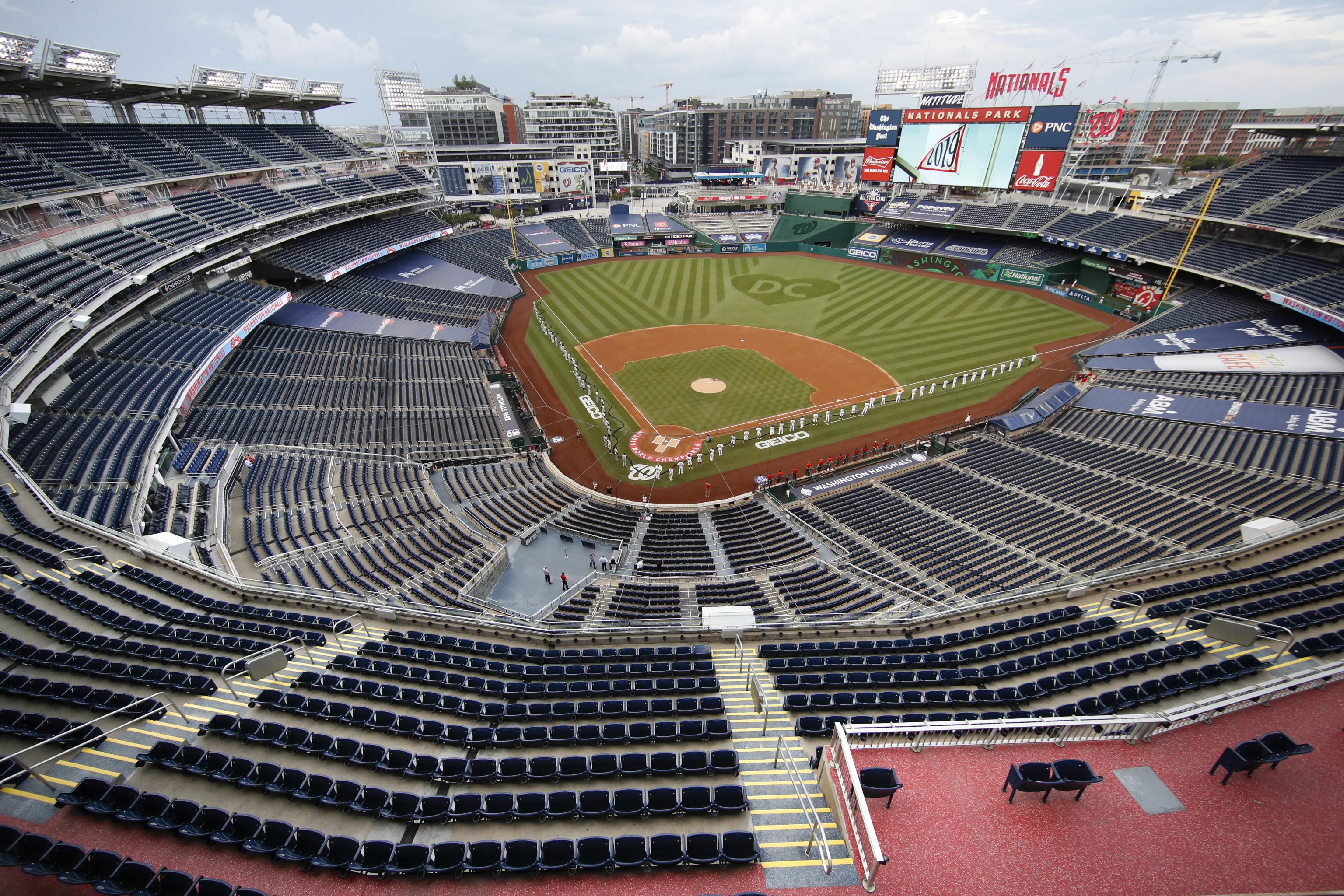 Yankees and Nationals Kneel in Moment of Silence Before MLB Opener