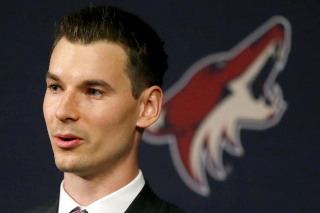 FILE - In this May 5, 2016, file photo, Arizona Coyotes general manager John Chayka speaks at a news conference in Glendale, Ariz. Chayka turned interest in hockey analytics into a business. The success of that business led him to become the youngest general manager in any major sport with the Arizona Coyotes. (AP Photo/Matt York, File)