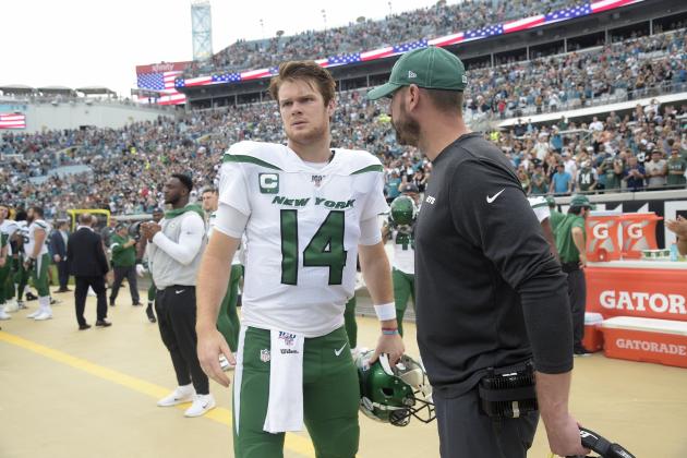 New York Jets head coach Adam Gase, right, talks to quarterback Sam Darnold (14) on the sideline prior to the start the first half of an NFL football game against the Jacksonville Jaguars Sunday, Oct. 27, 2019, in Jacksonville, Fla. (AP Photo/Phelan M. Ebenhack)