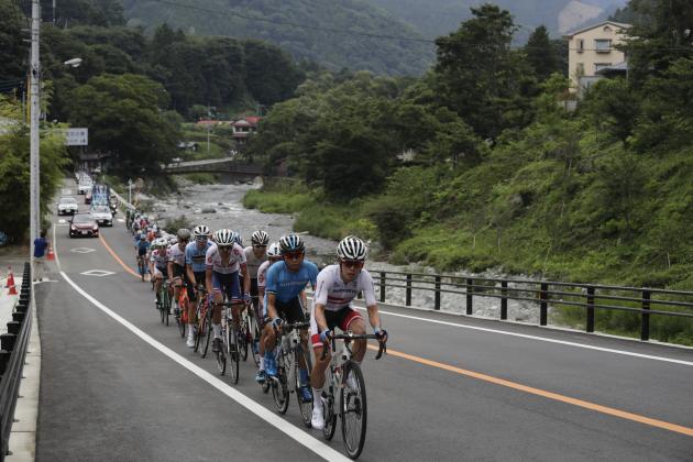 Cyclists compete during a road cycling test event for the Tokyo 2020 Olympic Games, Sunday, July 21, 2019, in Yamanashi Prefecture, southwest of Tokyo. (AP Photo/Jae C. Hong)