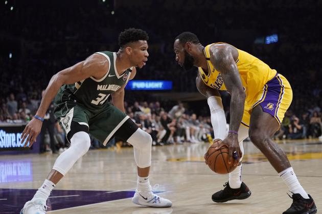 Los Angeles Lakers forward LeBron James, tries to get past Milwaukee Bucks forward Giannis Antetokounmpo during the second half of an NBA basketball game Friday, March 6, 2020, in Los Angeles. (AP Photo/Mark J. Terrill)