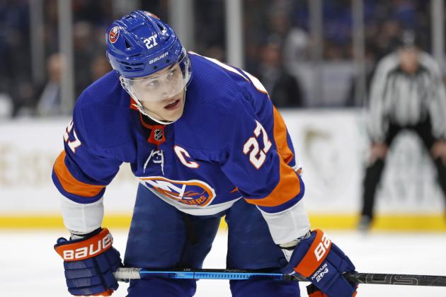 New York Islanders left wing Anders Lee (27) waits for a faceoff during the second period of an NHL hockey game against the New York Rangers, Tuesday, Feb. 25, 2020, in Uniondale, N.Y. (AP Photo/Kathy Willens)