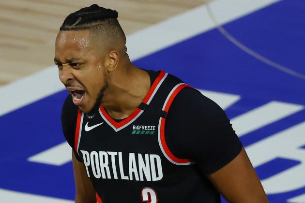 Portland Trail Blazers' CJ McCollum celebrates against the Memphis Grizzlies during the second half of an NBA basketball game Saturday, Aug. 15, 2020, in Lake Buena Vista, Fla. (Kevin C. Cox/Pool Photo via AP)