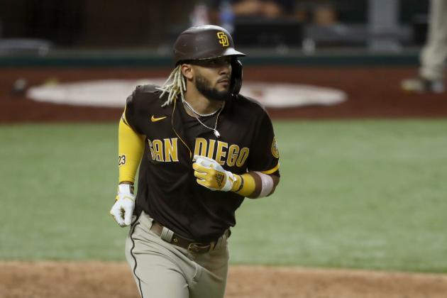 San Diego Padres' Fernando Tatis Jr. runs the bases after hitting a grand slam off of Texas Rangers relief pitcher Juan Nicasio in the eighth inning of a baseball game in Arlington, Texas, Monday Aug. 17, 2020. The shot scored Jurickson Profar, Josh Naylor and Trent Grisham. (AP Photo/Tony Gutierrez)
