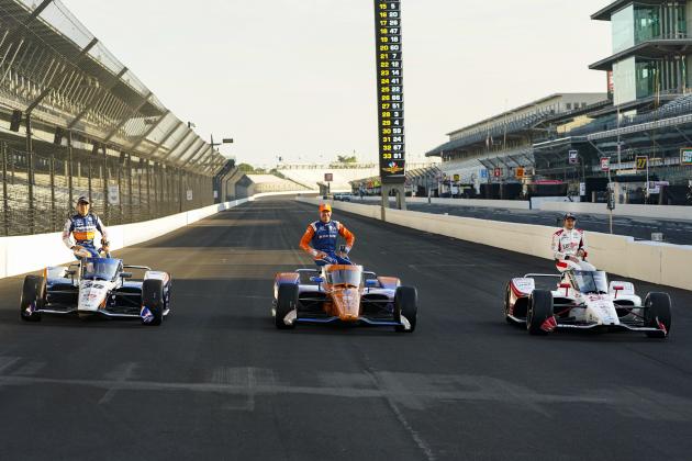 Marco Andretti, right, poses, with Scott Dixon, of New Zealand, center and Takuma Sato, of Japan, during the front row photos session for the Indianapolis 500 auto race at Indianapolis Motor Speedway in Indianapolis, Monday, Aug. 17, 2020. Andretti won the pole for Sunday's race. (AP Photo/Michael Conroy)