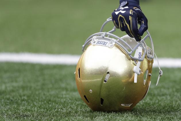 A Notre Dame player holds his helmet after running onto to field before an NCAA college football game Saturday, Oct. 29, 2016, in South Bend, Ind.   (AP Photo/Darron Cummings)