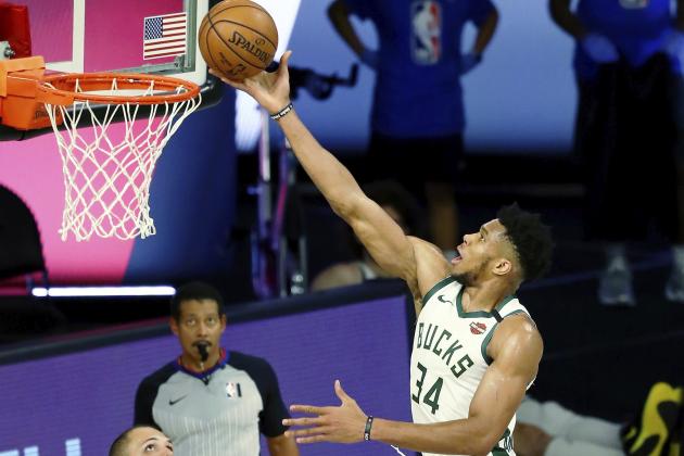 Milwaukee Bucks forward Giannis Antetokounmpo (34) shoots against the Orlando Magic during the second half of Game 1 of an NBA basketball first-round playoff series, Tuesday, Aug. 18, 2020, in Lake Buena Vista, Fla. (Kim Klement/Pool Photo via AP)