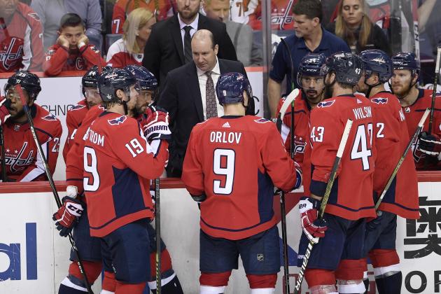 Washington Capitals head coach Todd Reirden, center, talks to his team during the third period of Game 7 of an NHL hockey first-round playoff series against the Carolina Hurricanes, Wednesday, April 24, 2019, in Washington. (AP Photo/Nick Wass)