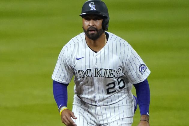 Colorado Rockies' Matt Kemp celebrates a run scored against the San Francisco Giants during the sixth inning of a baseball game, Monday, Aug. 3, 2020, in Denver. (AP Photo/Jack Dempsey)