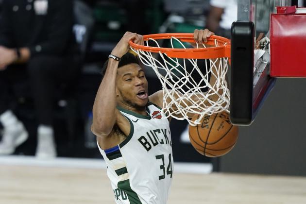 Milwaukee Bucks' Giannis Antetokounmpo (34) dunks the ball during the second half of an NBA basketball first round playoff game against the Orlando Magic Monday, Aug. 24, 2020, in Lake Buena Vista, Fla. (AP Photo/Ashley Landis, Pool)