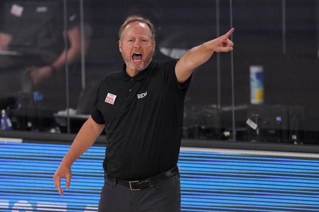 Milwaukee Bucks head coach Mike Budenholzer instructs his team during the first half of an NBA basketball conference semifinal playoff game against the Miami Heat on Monday, Aug. 31, 2020, in Lake Buena Vista, Fla. (AP Photo/Mark J. Terrill)
