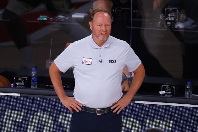 Milwaukee Bucks coach Mike Budenholzer watches the team play the Dallas Mavericks during an NBA basketball game Saturday, Aug. 8, 2020, in Lake Buena Vista, Fla. (Kevin C. Cox/Pool Photo via AP)