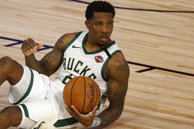 Milwaukee Bucks' Eric Bledsoe (6) lays on the floor after a foul against the Orlando Magic during Game 3 of an NBA basketball first-round playoff series, Saturday, Aug. 22, 2020, in Lake Buena Vista, Fla. (Mike Ehrmann/Pool Photo via AP)