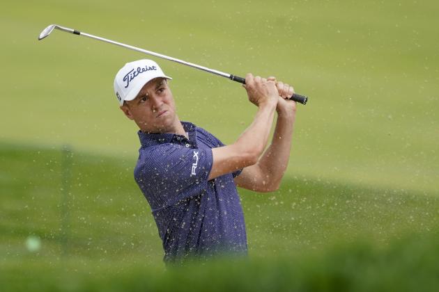 Justin Thomas, of the United States, plays a shot from a bunker on the 17th hole during the first round of the US Open Golf Championship, Thursday, Sept. 17, 2020, in Mamaroneck, N.Y. (AP Photo/Charles Krupa)