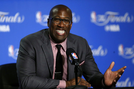 FILE - In this June 1, 2017, file photo, Golden State Warriors interim head coach Mike Brown answers questions during a news conference after Game 1 of basketball's NBA Finals against the Cleveland Cavaliers in Oakland, Calif. Brown has a do-for-others nature and as the Warriors host Cleveland on Christmas Day everyone will remember exactly what he did to help guide Golden State to a second title in three years last June as he filled in for ailing head coach Steve Kerr. (AP Photo/Ben Margot, File)