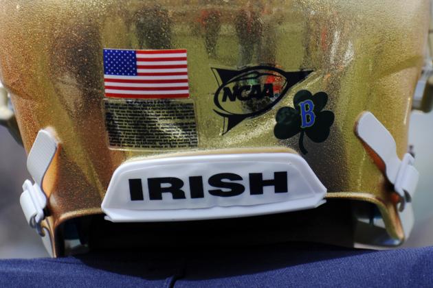 FILE - In this April 20, 2013, file photo, to honor those injured and killed in the Boston Marathon bombings, Notre Dame players wore helmets with a B and a shamrock logo on them during the Blue-Gold spring NCAA college football game in South Bend, Ind. (AP Photo/Joe Raymond, File)