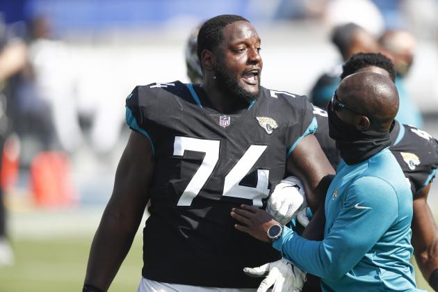 Jacksonville Jaguars offensive tackle Cam Robinson (74) has words with a Tennessee Titans player after an NFL football game Sunday, Sept. 20, 2020, in Nashville, Tenn. (AP Photo/Wade Payne)