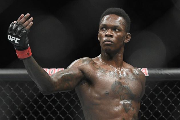Nigeria's Israel Adesanya poses as he fights Brazil's Anderson Silva in their middleweight bout at the UFC 234 event in Melbourne, Australia, Sunday, Feb. 10, 2019. (AP Photo/Andy Brownbill)