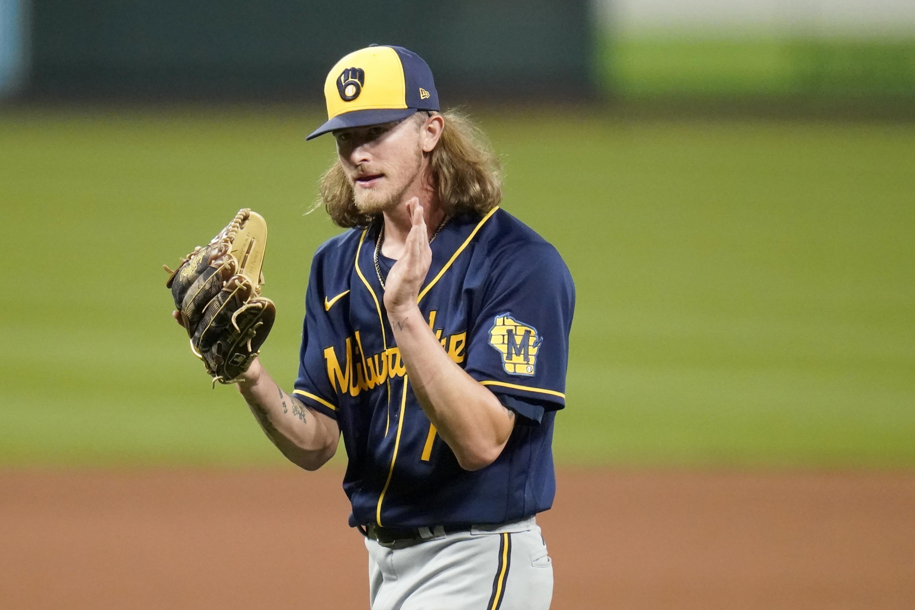 Brewers pitcher Devin Williams reacts after Josh Hader trade to Padres