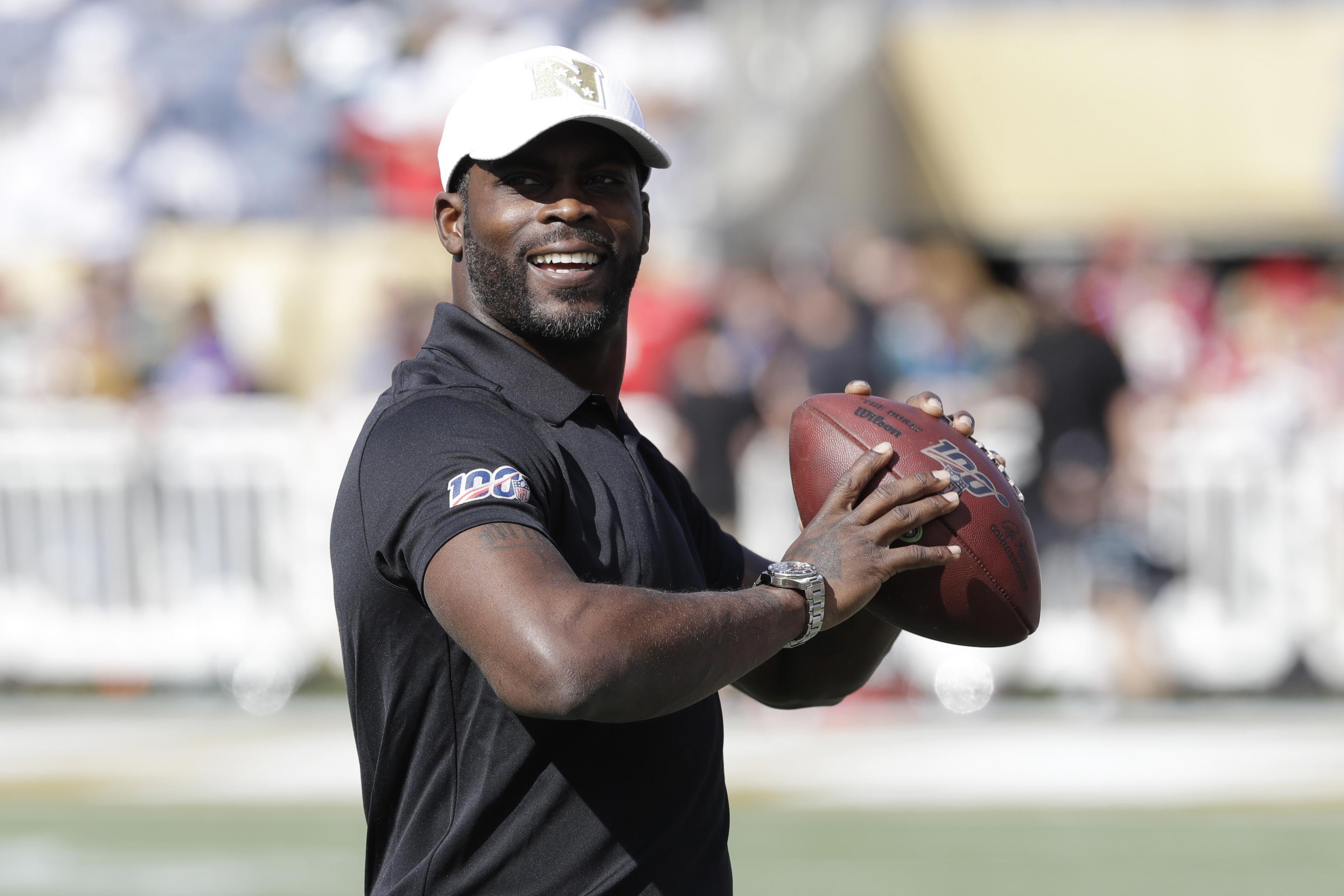 VIDEO: Michael Vick Votes for First Time After Dogfighting Conviction