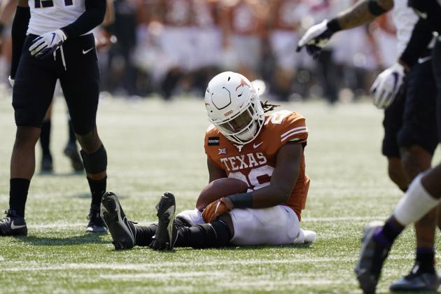 Texas running back Keaontay Ingram (26) reacts after he was stopped short of a touchdown on a run against TCU during the second half of an NCAA college football game, Saturday, Oct. 3, 2020, in Austin, Texas. (AP Photo/Eric Gay)