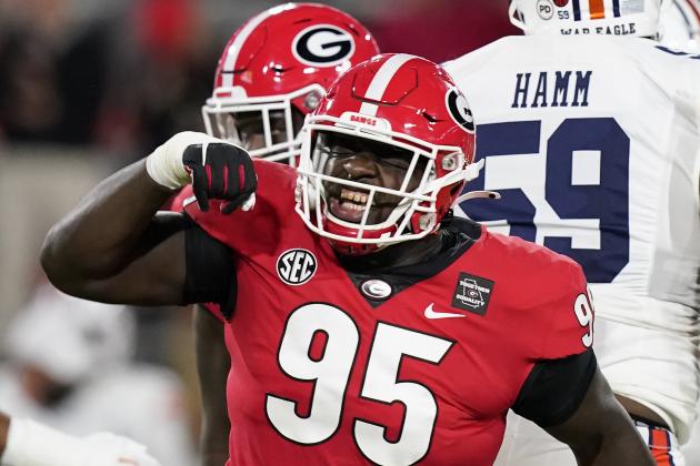 Georgia defensive lineman Jordan Davis (99) celebrates after sacking Auburn quarterback Bo Nix during the first half of an NCAA college football game Saturday, Oct. 3, 2020, in Athens, Ga. (AP Photo/Brynn Anderson)