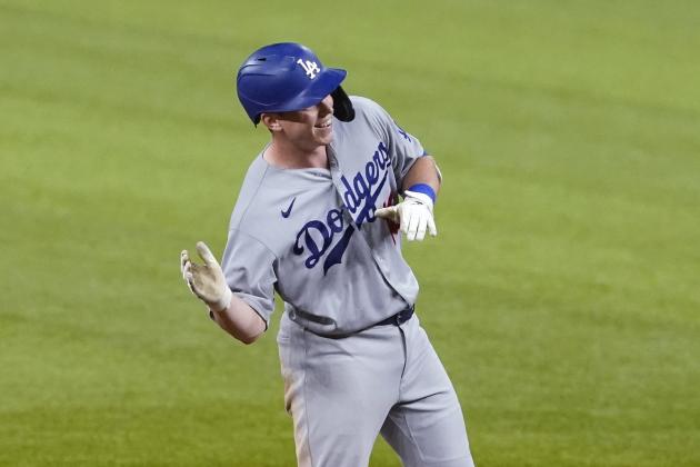 Los Angeles Dodgers' Will Smith gestures as he celebrates after his two-RBI double, his fifth hit of the game, against the San Diego Padres during the ninth inning in Game 3 of a baseball National League Division Series Thursday, Oct. 8, 2020, in Arlington, Texas. (AP Photo/Tony Gutierrez)