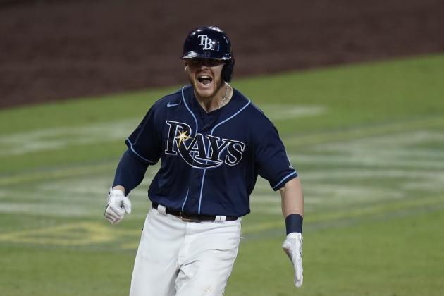 Tampa Bay Rays' Michael Brosseau celebrates after hitting a solo home run during the eighth inning in Game 5 of a baseball AL Division Series against the New York Yankees, Friday, Oct. 9, 2020, in San Diego. (AP Photo/Jae C. Hong)