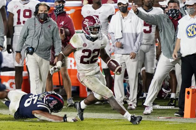 Alabama running back Najee Harris (22) runs past Mississippi linebacker MoMo Sanogo (46) during the second half of an NCAA college football game in Oxford, Miss., Saturday, Oct. 10, 2020. Alabama won 63-48. (AP Photo/Rogelio V. Solis)